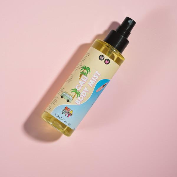 cali body mist in a bottle on a pink background