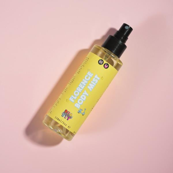 florence mist in a bottle on  a pink background